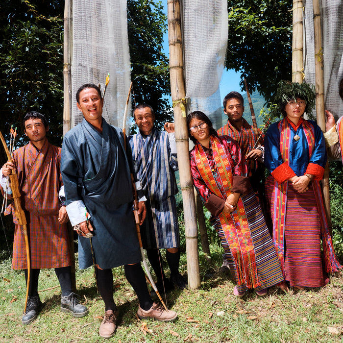 people wearing different textiles from bhutan